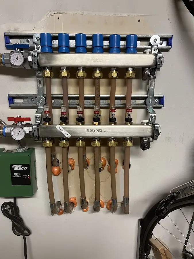 Plumber performing Water Heater Repair at a residential property in Drexel Heights